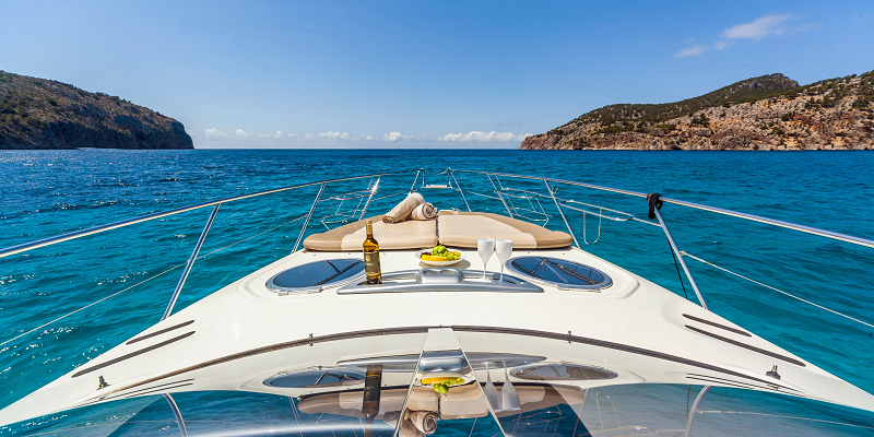 Bow sunbathing Gin Tonic Cranchi yacht charter Mallorca 2