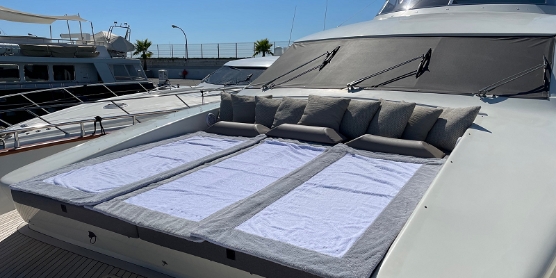 Canados 86 Kitty Kat yacht for charter in Mallorca bow sunbathing