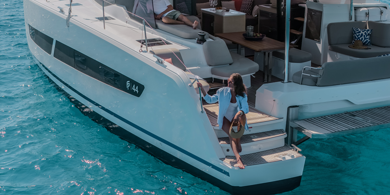 Catamaran Charter Mallorca Fountaine Pajot 44ft couple relaxing