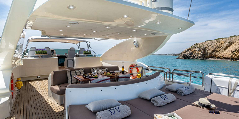 Dolce-Vita-II-Astondoa-102-luxury-yacht-charter-Balearics-Exterior-sunbathing-flybridge