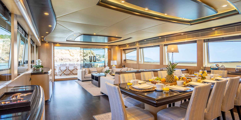 Dolce-Vita-II-Astondoa-102-luxury-yacht-charter-Balearics-Interior-dining-table-10pax