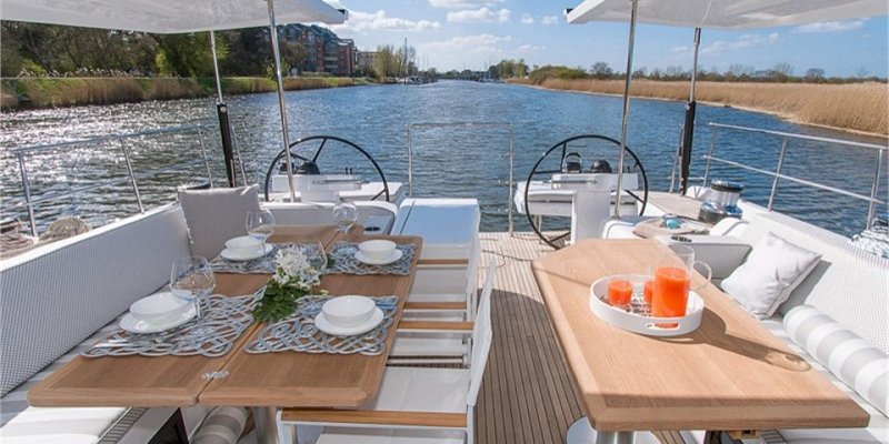 Hanse 675 Agarimo Six Exterior sailing yacht charter dining