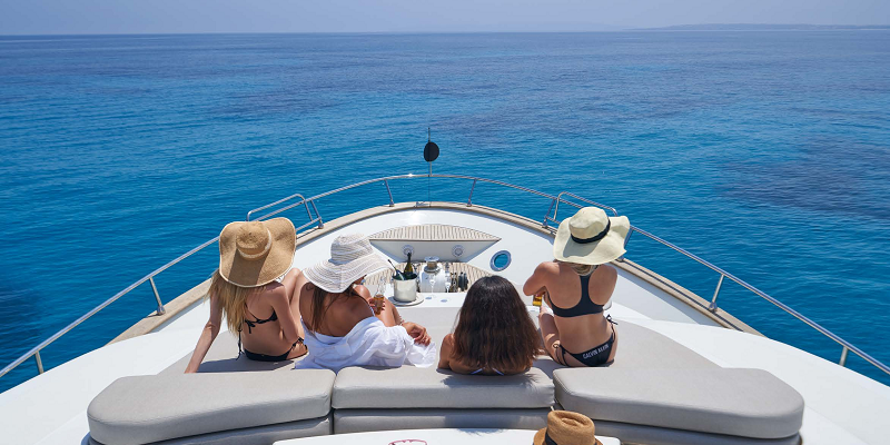 Julie_II_Astondoa_for_charter__yacht_Ibiza_sunbathing_on_bow