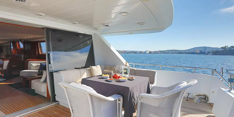 Paladio yacht charter aft deck dining table