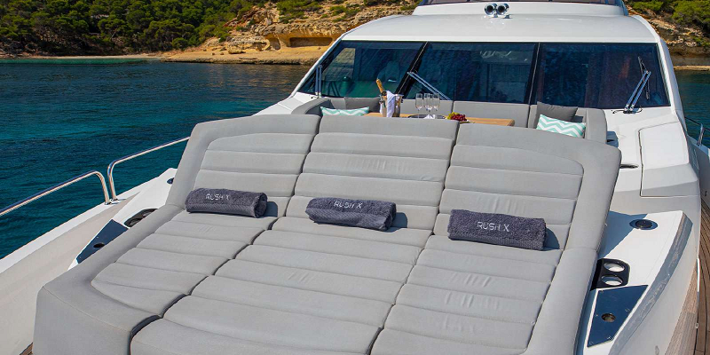 Sunseeker yacht charter sunbathing bow Rush X