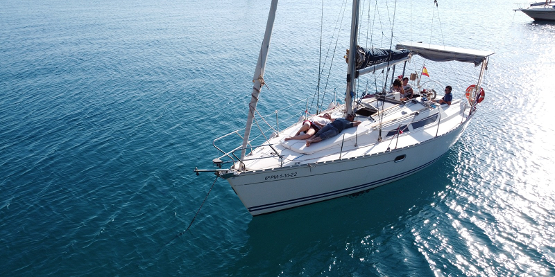 Sargay Sail boat for charter in port Andratx Mallorca sunbathing